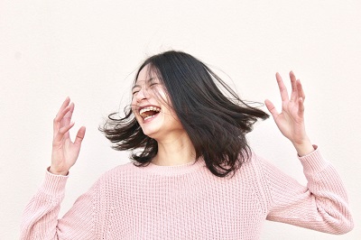 Laughing woman Photo by gabrielle cole on Unsplash